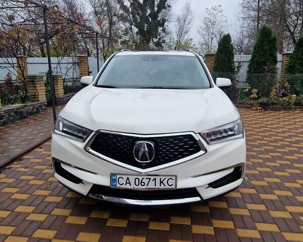 Белый Акура МДХ, объемом двигателя 3.47 л и пробегом 130 тыс. км за 20900 $, фото 1 на Automoto.ua
