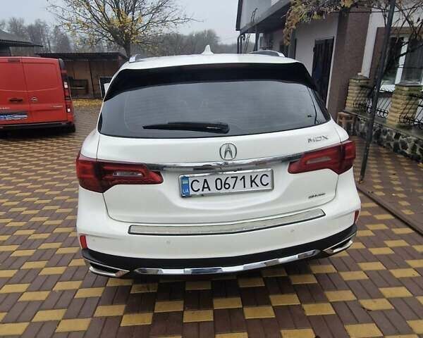 Белый Акура МДХ, объемом двигателя 3.47 л и пробегом 130 тыс. км за 20900 $, фото 4 на Automoto.ua
