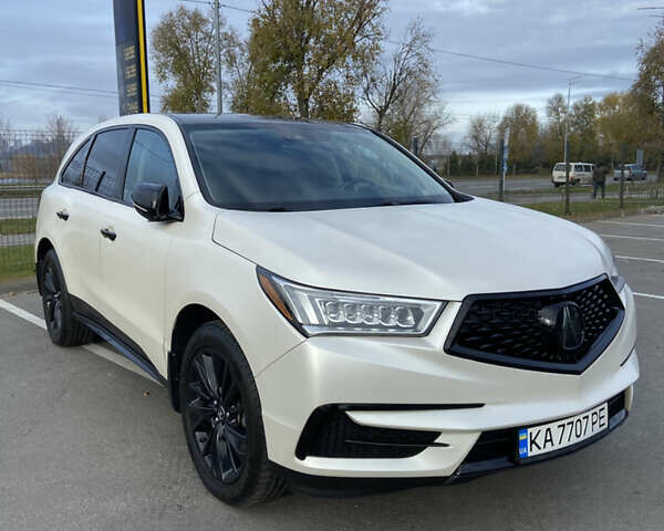 Белый Акура МДХ, объемом двигателя 3.5 л и пробегом 102 тыс. км за 22000 $, фото 1 на Automoto.ua