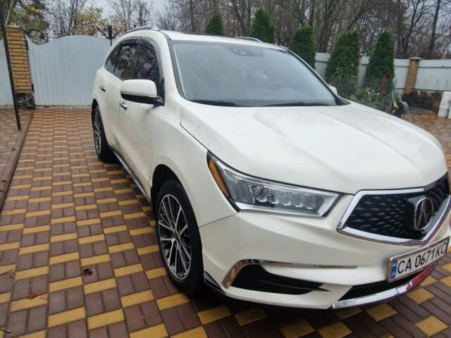 Белый Акура МДХ, объемом двигателя 3.5 л и пробегом 131 тыс. км за 20900 $, фото 1 на Automoto.ua