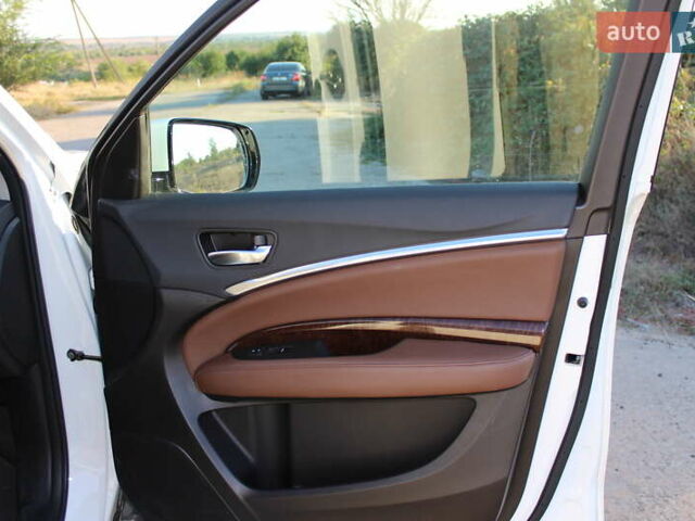 Белый Акура МДХ, объемом двигателя 3.5 л и пробегом 80 тыс. км за 26000 $, фото 20 на Automoto.ua