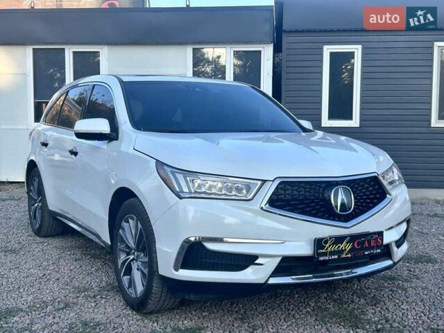 Белый Акура МДХ, объемом двигателя 3.47 л и пробегом 112 тыс. км за 29500 $, фото 2 на Automoto.ua