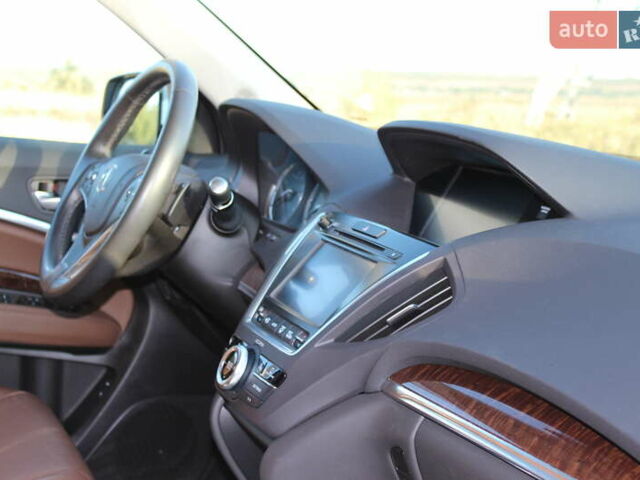 Белый Акура МДХ, объемом двигателя 3.5 л и пробегом 80 тыс. км за 26000 $, фото 24 на Automoto.ua