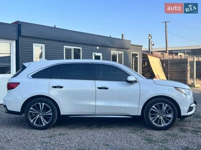 Белый Акура МДХ, объемом двигателя 3.47 л и пробегом 112 тыс. км за 29500 $, фото 3 на Automoto.ua