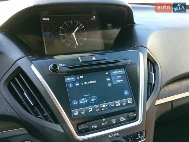Белый Акура МДХ, объемом двигателя 3.47 л и пробегом 79 тыс. км за 31000 $, фото 26 на Automoto.ua