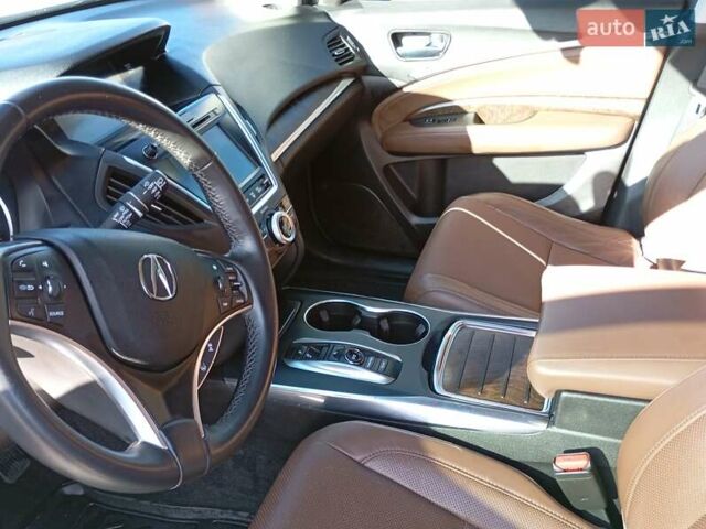 Белый Акура МДХ, объемом двигателя 3.47 л и пробегом 79 тыс. км за 31000 $, фото 13 на Automoto.ua