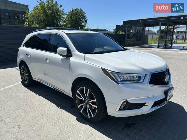 Белый Акура МДХ, объемом двигателя 3.47 л и пробегом 153 тыс. км за 31000 $, фото 1 на Automoto.ua