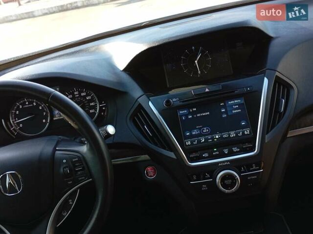 Белый Акура МДХ, объемом двигателя 3.47 л и пробегом 79 тыс. км за 31000 $, фото 32 на Automoto.ua