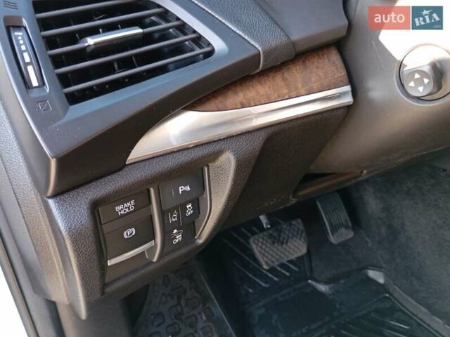 Белый Акура МДХ, объемом двигателя 3.47 л и пробегом 79 тыс. км за 31000 $, фото 12 на Automoto.ua