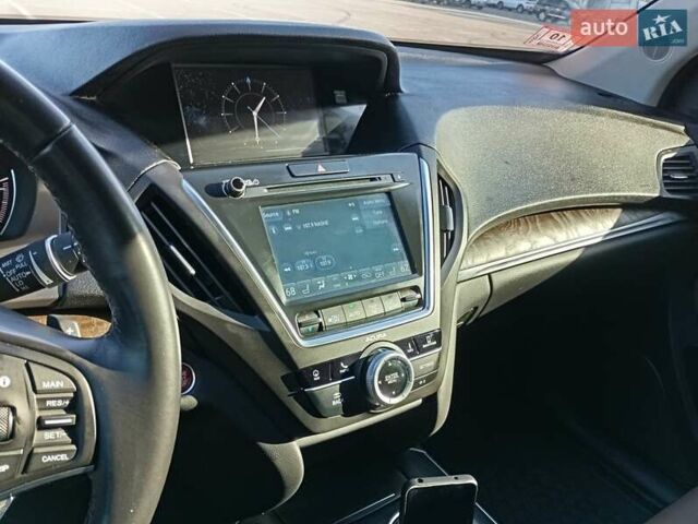 Белый Акура МДХ, объемом двигателя 3.47 л и пробегом 79 тыс. км за 31000 $, фото 37 на Automoto.ua