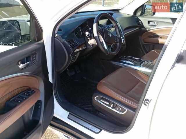 Белый Акура МДХ, объемом двигателя 3.47 л и пробегом 79 тыс. км за 31000 $, фото 10 на Automoto.ua