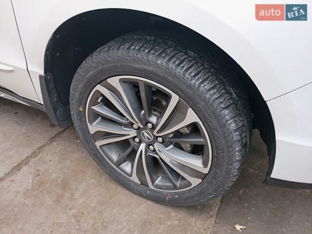 Белый Акура МДХ, объемом двигателя 3.47 л и пробегом 79 тыс. км за 31000 $, фото 1 на Automoto.ua