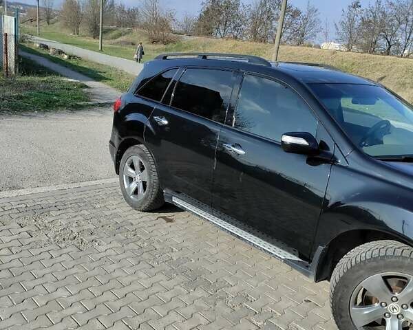 Черный Акура МДХ, объемом двигателя 3.66 л и пробегом 188 тыс. км за 9500 $, фото 1 на Automoto.ua