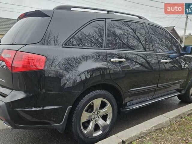 Черный Акура МДХ, объемом двигателя 3.66 л и пробегом 153 тыс. км за 8950 $, фото 1 на Automoto.ua