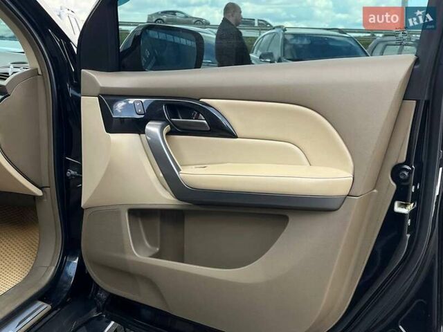 Черный Акура МДХ, объемом двигателя 3.7 л и пробегом 260 тыс. км за 11490 $, фото 2 на Automoto.ua