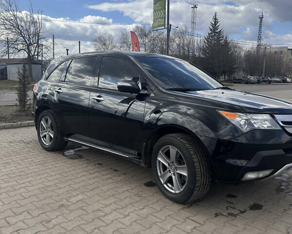 Черный Акура МДХ, объемом двигателя 3.66 л и пробегом 220 тыс. км за 11799 $, фото 1 на Automoto.ua