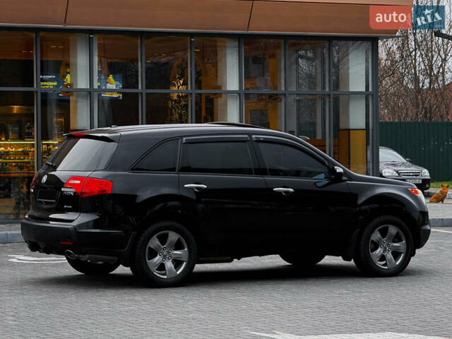 Черный Акура МДХ, объемом двигателя 3.7 л и пробегом 135 тыс. км за 11300 $, фото 3 на Automoto.ua