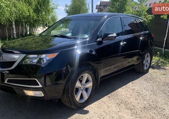 Черный Акура МДХ, объемом двигателя 3.66 л и пробегом 134 тыс. км за 16800 $, фото 1 на Automoto.ua