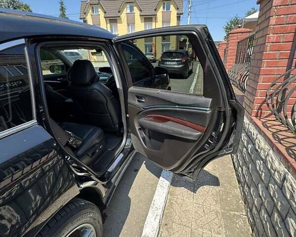 Черный Акура МДХ, объемом двигателя 3.47 л и пробегом 205 тыс. км за 18500 $, фото 9 на Automoto.ua