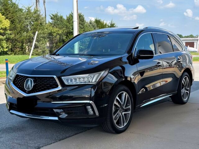 Черный Акура МДХ, объемом двигателя 3.5 л и пробегом 46 тыс. км за 14999 $, фото 2 на Automoto.ua