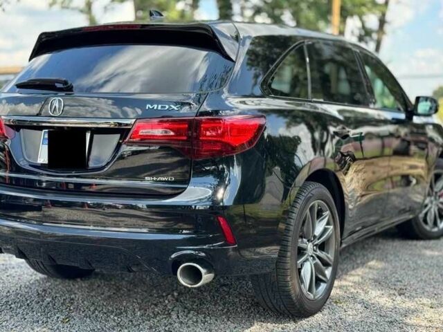 Черный Акура МДХ, объемом двигателя 3.5 л и пробегом 120 тыс. км за 19000 $, фото 1 на Automoto.ua