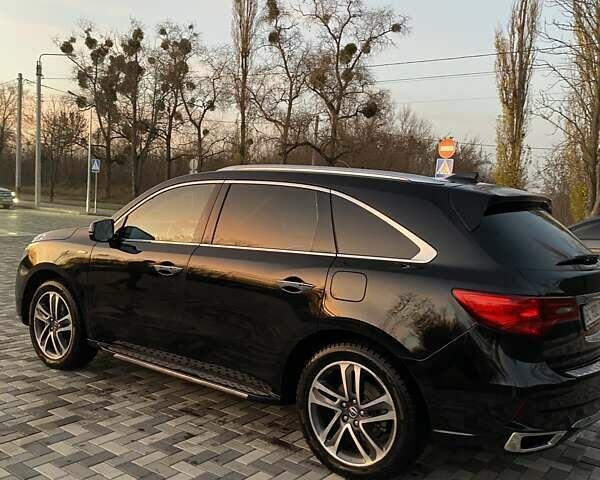 Черный Акура МДХ, объемом двигателя 3 л и пробегом 150 тыс. км за 31700 $, фото 1 на Automoto.ua