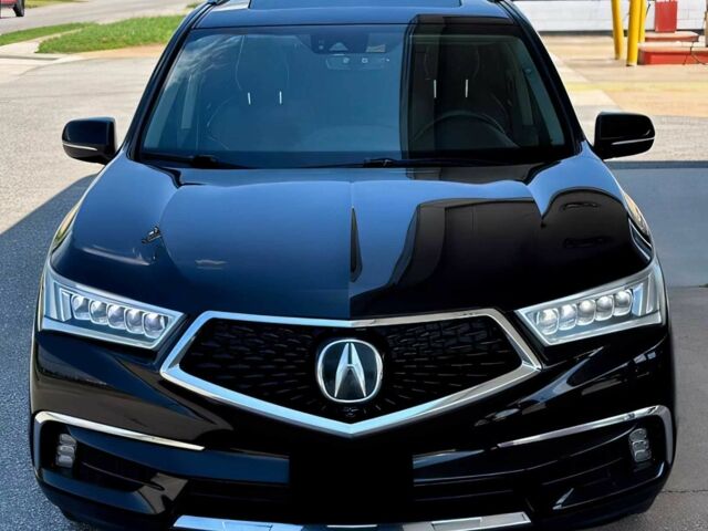 Черный Акура МДХ, объемом двигателя 3.5 л и пробегом 46 тыс. км за 14999 $, фото 1 на Automoto.ua