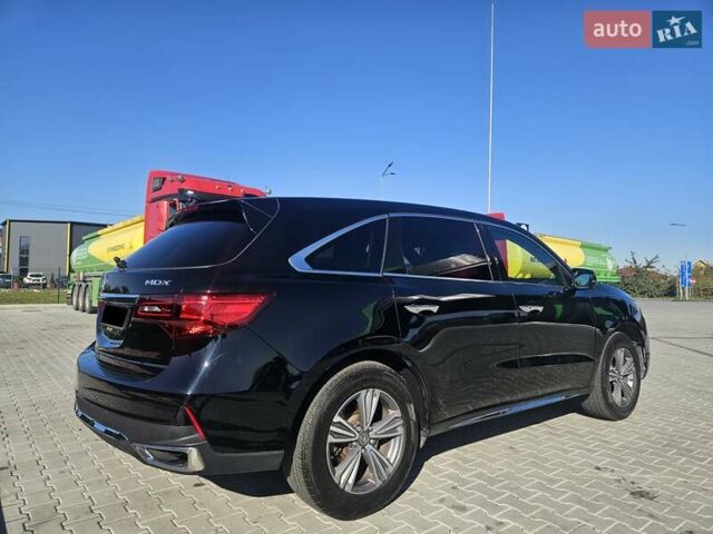 Черный Акура МДХ, объемом двигателя 3.47 л и пробегом 107 тыс. км за 30500 $, фото 3 на Automoto.ua