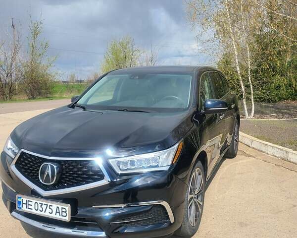 Черный Акура МДХ, объемом двигателя 3.47 л и пробегом 33 тыс. км за 31500 $, фото 1 на Automoto.ua