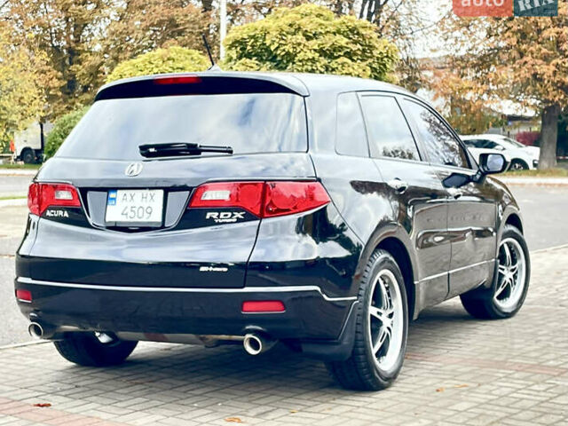 Акура РДХ 2008 у Ужгороді на Automoto.ua Чорний Акура РДХ, об'ємом двигуна 2.3 л та пробігом 163 тис. км за 8800 $, фото 4 на Automoto.ua