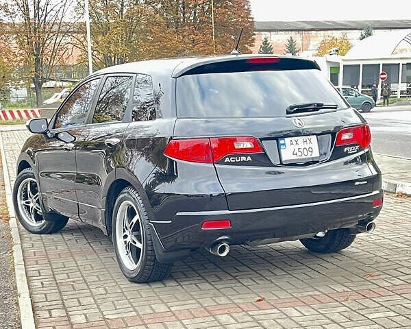 Акура РДХ 2008 у Ужгороді на Automoto.ua Чорний Акура РДХ, об'ємом двигуна 2.3 л та пробігом 163 тис. км за 8800 $, фото 5 на Automoto.ua