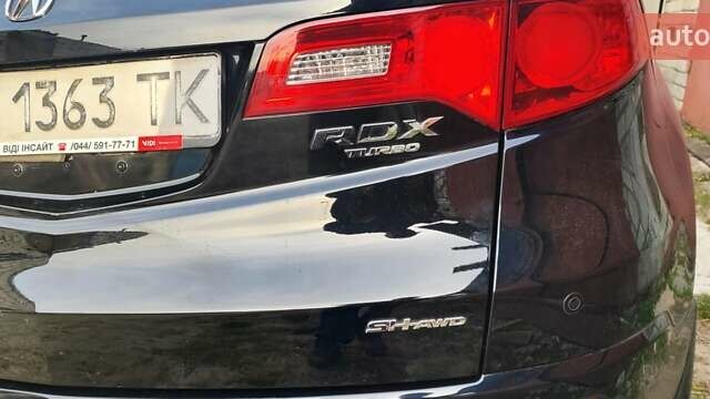 Черный Акура РДХ, объемом двигателя 2.3 л и пробегом 180 тыс. км за 8900 $, фото 4 на Automoto.ua