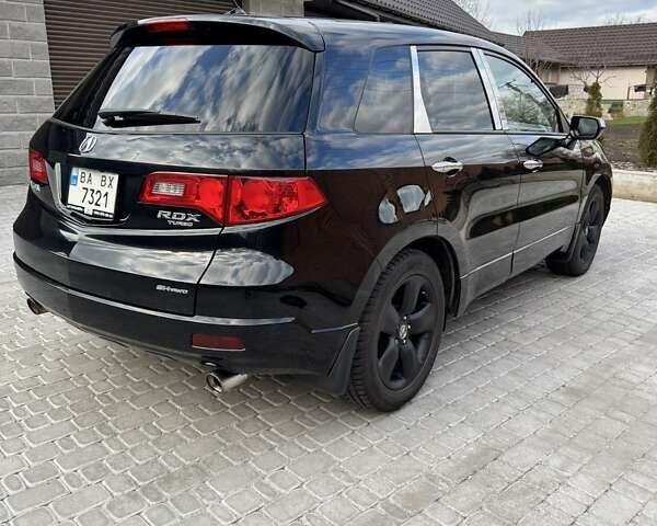Черный Акура РДХ, объемом двигателя 2.3 л и пробегом 145 тыс. км за 13000 $, фото 6 на Automoto.ua