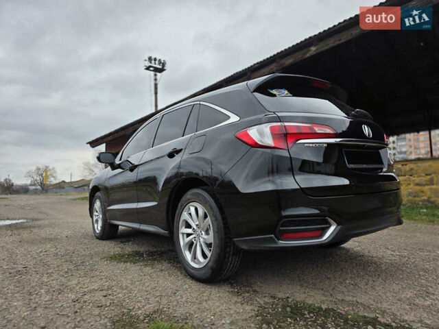 Черный Акура РДХ, объемом двигателя 3.5 л и пробегом 150 тыс. км за 15250 $, фото 3 на Automoto.ua