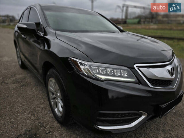 Черный Акура РДХ, объемом двигателя 3.5 л и пробегом 150 тыс. км за 15250 $, фото 1 на Automoto.ua