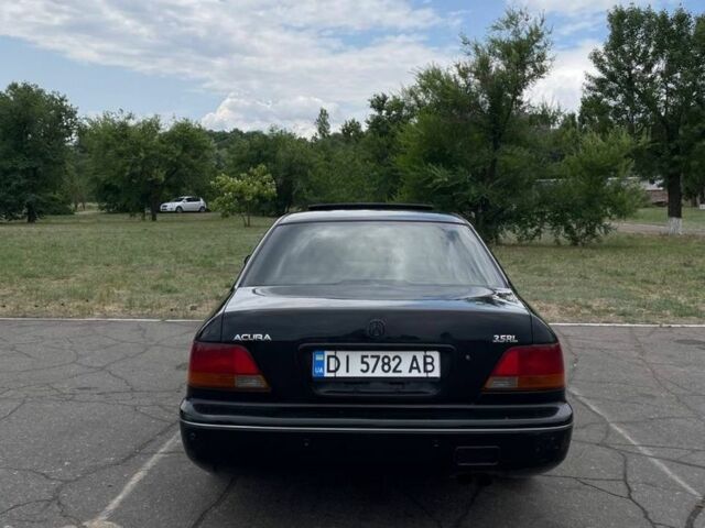 Черный Акура ТЛ, объемом двигателя 3.5 л и пробегом 376 тыс. км за 3800 $, фото 4 на Automoto.ua