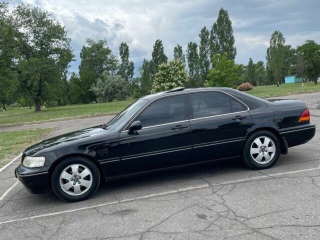 Черный Акура ТЛ, объемом двигателя 3.5 л и пробегом 376 тыс. км за 3800 $, фото 3 на Automoto.ua