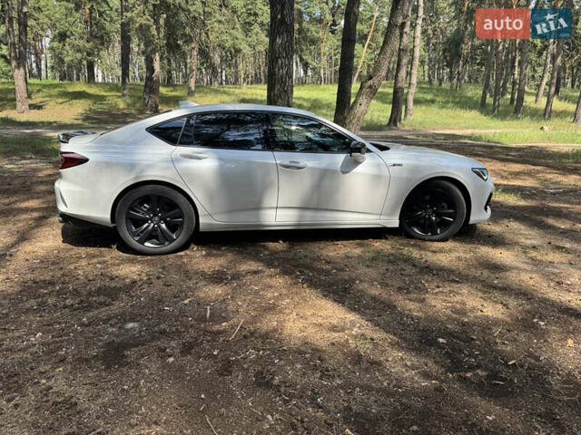 Білий Акура ТЛХ, об'ємом двигуна 2 л та пробігом 65 тис. км за 31000 $, фото 4 на Automoto.ua