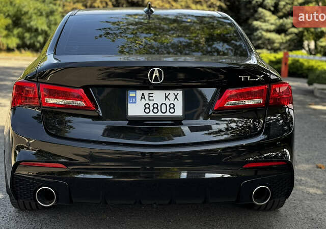 Черный Акура ТЛХ, объемом двигателя 2.36 л и пробегом 85 тыс. км за 15500 $, фото 2 на Automoto.ua