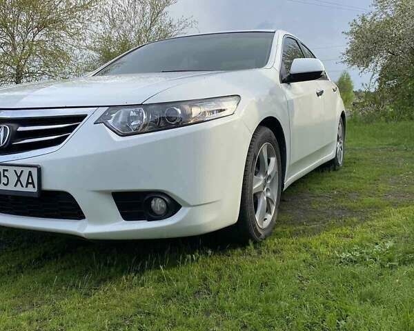 Белый Акура ТСХ, объемом двигателя 2.4 л и пробегом 230 тыс. км за 12300 $, фото 1 на Automoto.ua