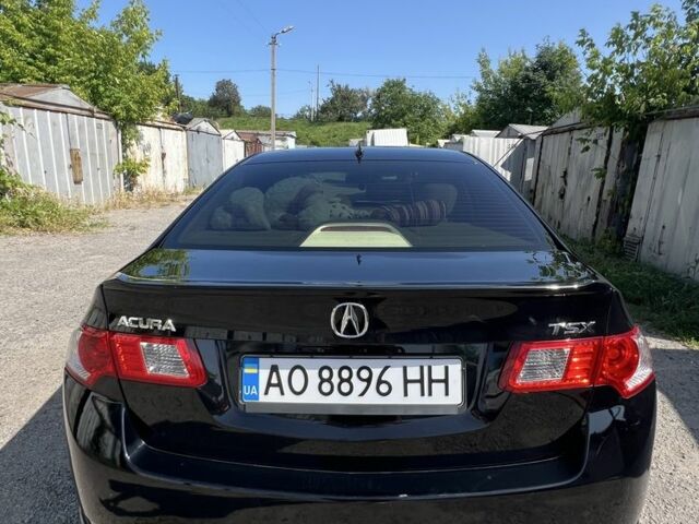 Черный Акура ТСХ, объемом двигателя 2.4 л и пробегом 144 тыс. км за 9700 $, фото 1 на Automoto.ua