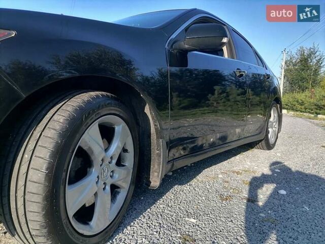 Черный Акура ТСХ, объемом двигателя 2.4 л и пробегом 210 тыс. км за 10000 $, фото 3 на Automoto.ua