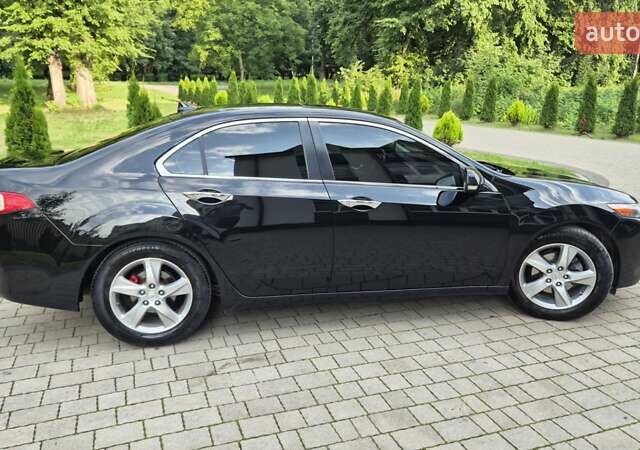 Чорний Акура ТСХ, об'ємом двигуна 2.4 л та пробігом 152 тис. км за 10999 $, фото 63 на Automoto.ua