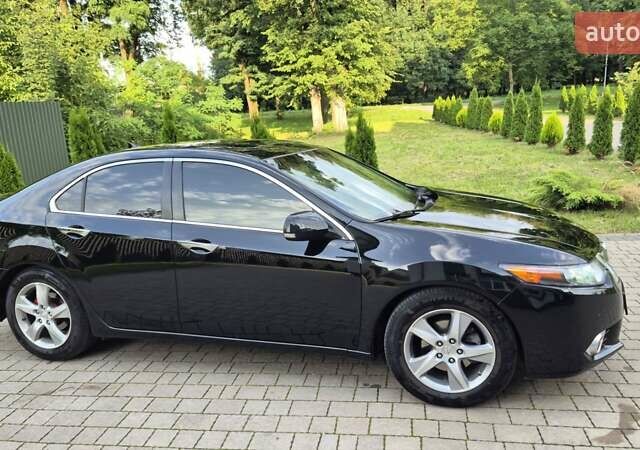 Чорний Акура ТСХ, об'ємом двигуна 2.4 л та пробігом 152 тис. км за 10999 $, фото 7 на Automoto.ua