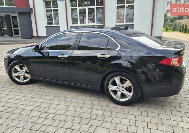 Чорний Акура ТСХ, об'ємом двигуна 2.4 л та пробігом 152 тис. км за 10999 $, фото 61 на Automoto.ua