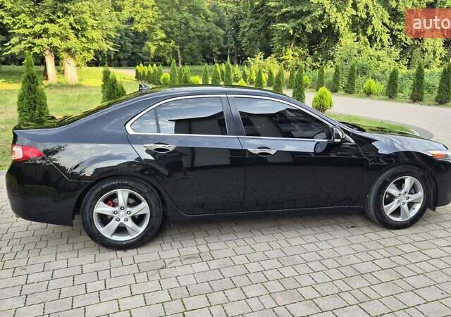 Чорний Акура ТСХ, об'ємом двигуна 2.4 л та пробігом 152 тис. км за 10999 $, фото 1 на Automoto.ua