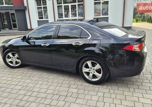 Чорний Акура ТСХ, об'ємом двигуна 2.4 л та пробігом 152 тис. км за 10999 $, фото 21 на Automoto.ua