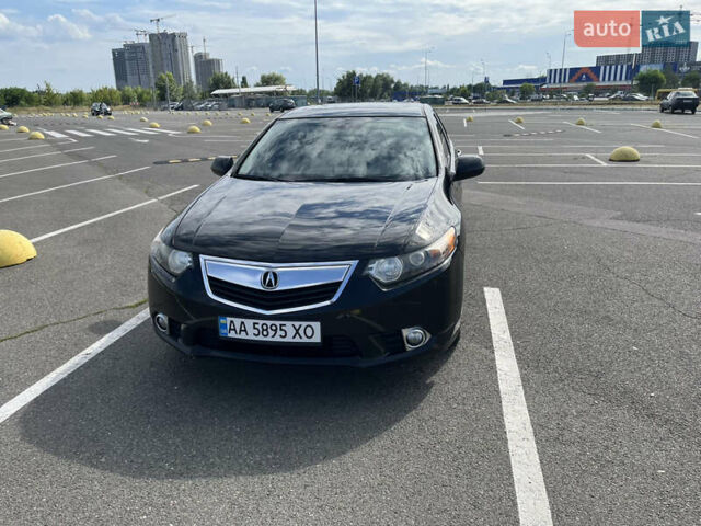 Черный Акура ТСХ, объемом двигателя 2.4 л и пробегом 208 тыс. км за 11500 $, фото 1 на Automoto.ua