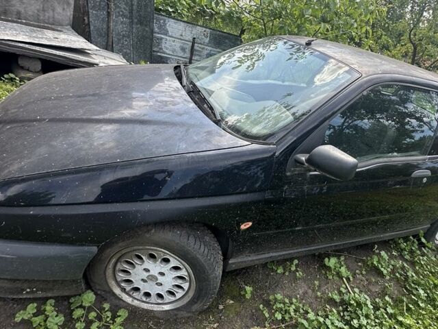 Черный Альфа 145, объемом двигателя 1.7 л и пробегом 10 тыс. км за 1100 $, фото 2 на Automoto.ua