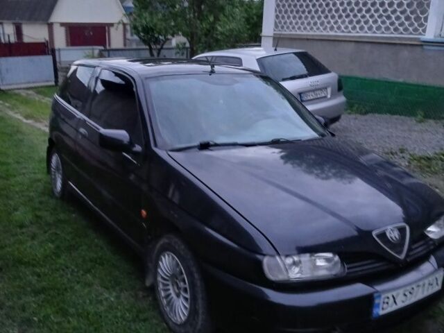 Черный Альфа 145, объемом двигателя 1.4 л и пробегом 300 тыс. км за 1750 $, фото 5 на Automoto.ua